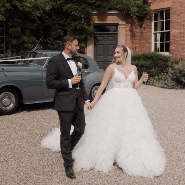Rebecca and Daniel celebrate their wedding at Hedingham castle on the 4th August 2023