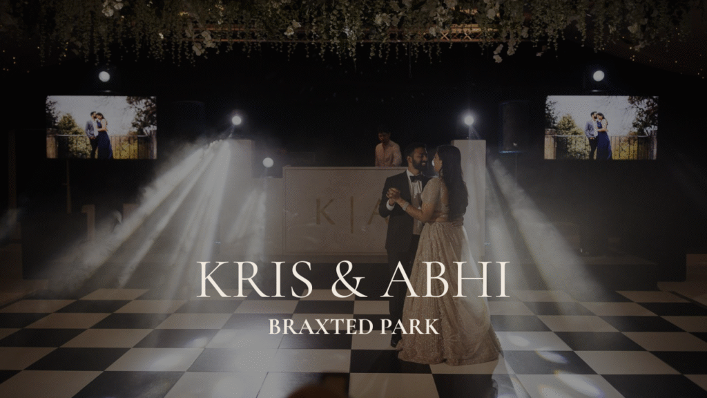 A bride and groom during an Asian wedding ceremony performing their first dance in the Braxted Park pavilion with dramatic backlighting creating a glowing silhouette.
