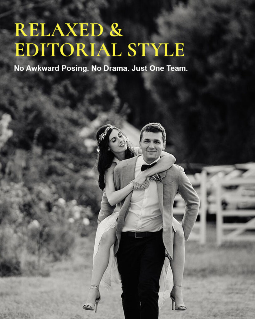A playful black and white reportage photo of a groom giving his bride a piggyback ride outside, with a text overlay about a relaxed, no-drama editorial style.
